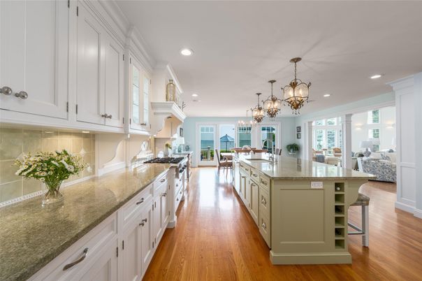 Chandelier, Dining room, Interior, Kitchen, Pendant Lights, Recessed Lighting, Water, Wood Texture Flooring