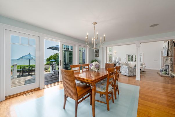 Chandelier, Dining room, Fireplace, Interior, Living room, Pendant Lights, Water, Wood Texture Flooring