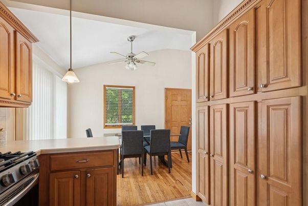 Dining room, Interior, Kitchen, Pendant Lights, Stainless Steel Appliances, Wood Texture Flooring