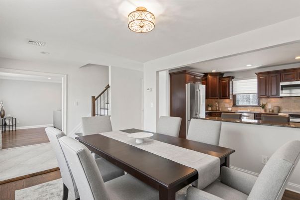 Dining room, Interior, Kitchen, Recessed Lighting, Stainless Steel Appliances, Wood Texture Flooring