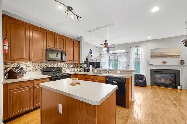 Fireplace, Interior, Kitchen, Recessed Lighting, Wood Texture Flooring