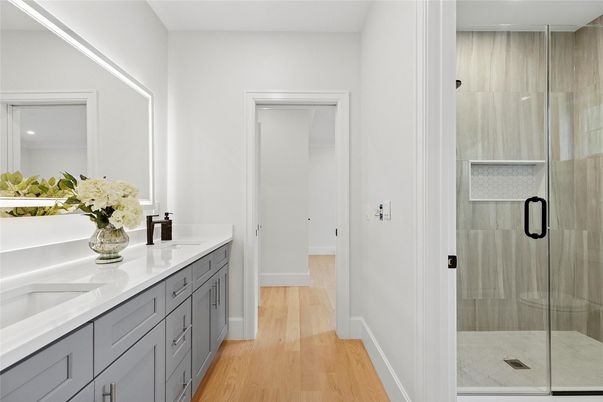 Bathroom, Dual Sink Vanities, Glass Shower, Interior, Wood Texture Flooring