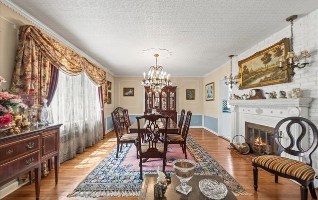 Chandelier, Dining room, Fireplace, Interior, Wood Texture Flooring