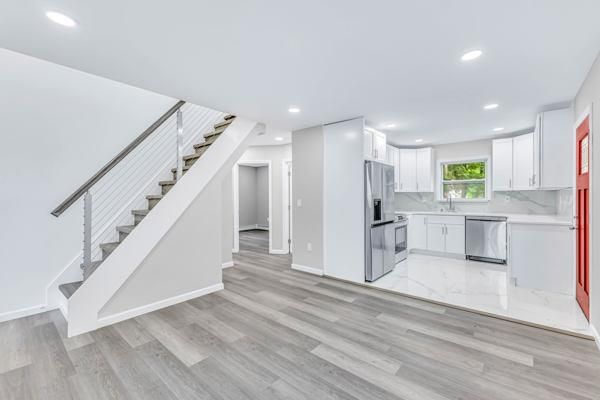 Interior, Kitchen, Marble, Recessed Lighting, Stainless Steel Appliances, Wood Texture Flooring