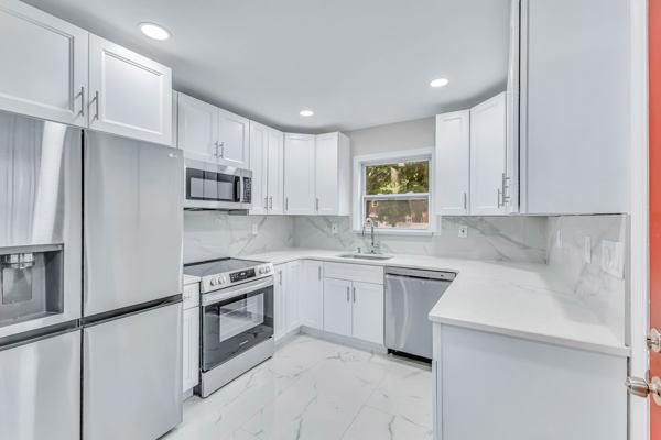Interior, Kitchen, Marble, Marble Walls, Recessed Lighting, Stainless Steel Appliances