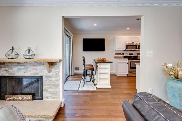 Fireplace, Interior, Kitchen, Recessed Lighting, Wood Texture Flooring