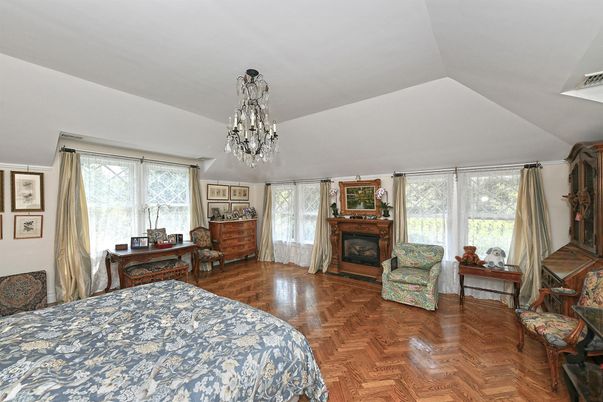 Bedroom, Chandelier, Fireplace, Interior, Wood Texture Flooring