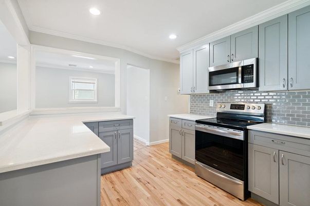 Interior, Kitchen, Recessed Lighting, Stainless Steel Appliances, Wood Texture Flooring