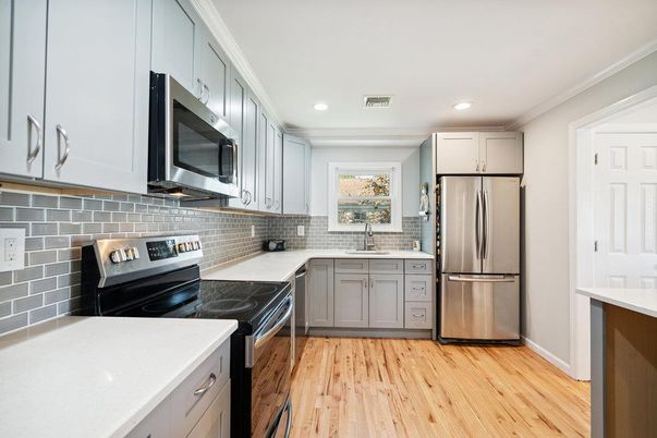 Interior, Kitchen, Recessed Lighting, Stainless Steel Appliances, Wood Texture Flooring