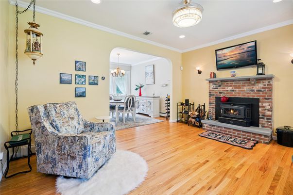 Chandelier, Dining room, Fireplace, Interior, Recessed Lighting, Wood Texture Flooring