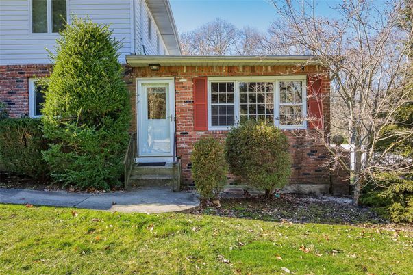 Exterior, Facade, Brick Facade, Cape Cod