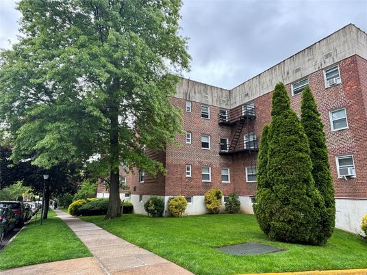 Exterior, Facade, Brick Facade, Condo Building