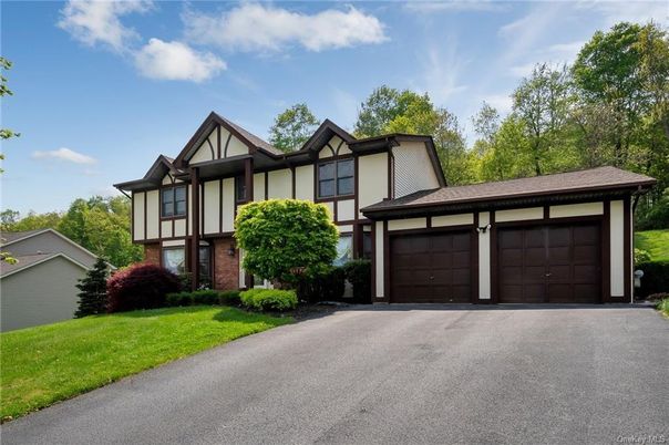 Attached, Exterior, Facade, Tudor Revival
