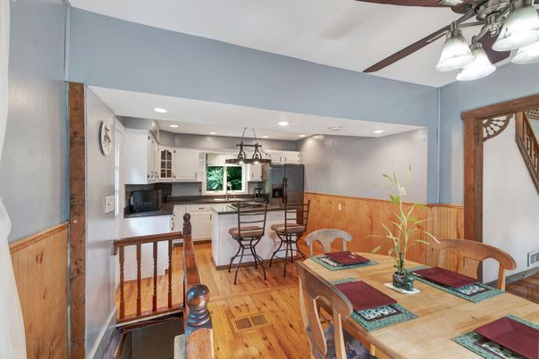 Dining room, Interior, Kitchen, Recessed Lighting, Stainless Steel Appliances, Wood Texture Flooring