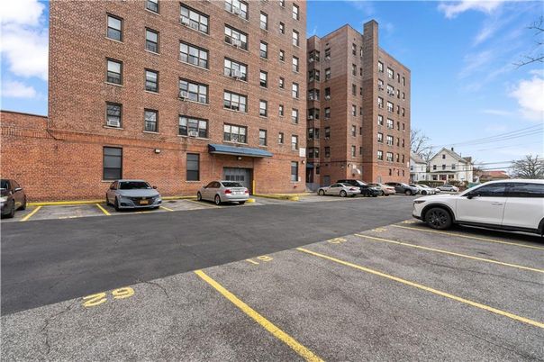 Exterior, Facade, Brick Facade, Condo Building