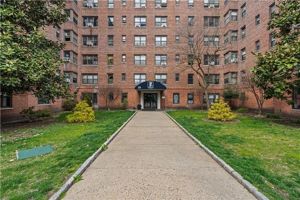 Exterior, Facade, Brick Facade, Condo Building