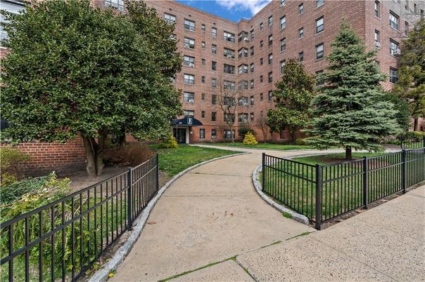 Exterior, Facade, Brick Facade, Condo Building