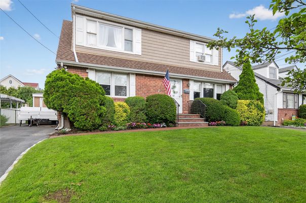Exterior, Facade, Brick Facade, Cape Cod