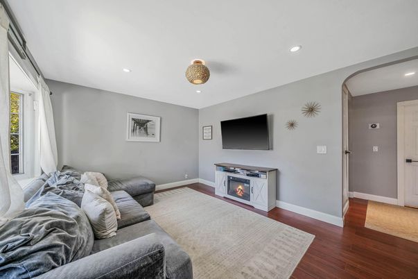 Fireplace, Interior, Living room, Recessed Lighting, Wood Texture Flooring