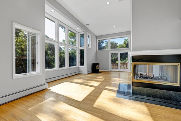 Fireplace, Interior, Recessed Lighting, Sun Room, Wood Texture Flooring