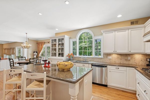 Chandelier, Dining room, Interior, Kitchen, Recessed Lighting, Stainless Steel Appliances, Wood Texture Flooring