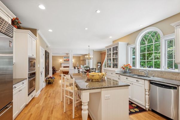 Chandelier, Dining room, Interior, Kitchen, Recessed Lighting, Stainless Steel Appliances, Wood Texture Flooring
