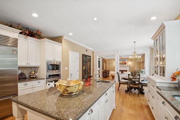 Chandelier, Dining room, Interior, Kitchen, Recessed Lighting, Stainless Steel Appliances, Wood Texture Flooring