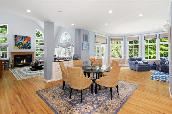 Dining room, Fireplace, Interior, Living room, Recessed Lighting, Wood Texture Flooring