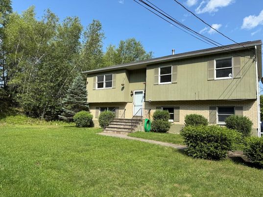 Exterior, Facade, Brick Facade, Raised Ranch