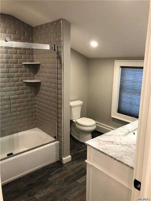Bathroom, Glass Shower, Interior, Recessed Lighting, Wood Texture Flooring