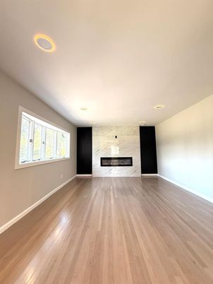 Empty room, Fireplace, Interior, Recessed Lighting, Wood Texture Flooring
