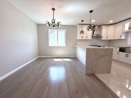 Interior, Kitchen, Marble Walls, Pendant Lights, Recessed Lighting, Wood Texture Flooring
