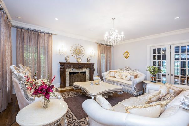 Chandelier, Fireplace, Interior, Living room, Recessed Lighting, Wood Texture Flooring