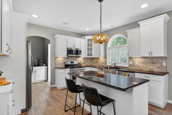 Chandelier, Interior, Kitchen, Pendant Lights, Recessed Lighting, Stainless Steel Appliances, Wood Texture Flooring