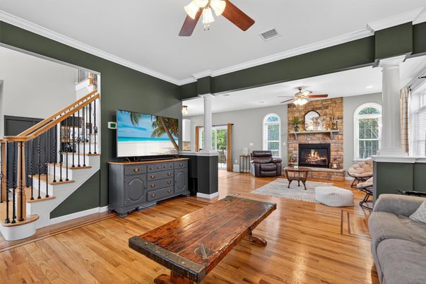 Fireplace, Interior, Living room, Recessed Lighting, Stone Walls, Wood Texture Flooring