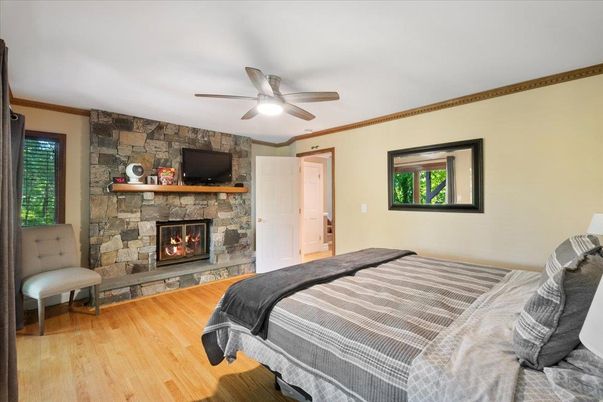 Bedroom, Fireplace, Interior, Stone Walls, Wood Texture Flooring