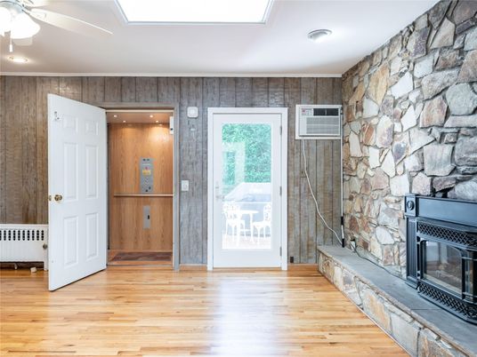 Fireplace, Interior, Recessed Lighting, Stone Walls, Wood Texture Flooring, Wooden Walls