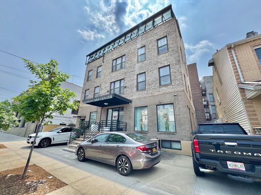 Exterior, Facade, Brick Facade, Condo Building