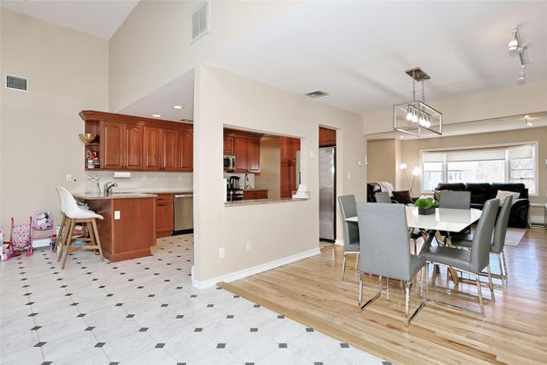 Dining room, Interior, Kitchen, Pendant Lights, Recessed Lighting, Stainless Steel Appliances, Wood Texture Flooring