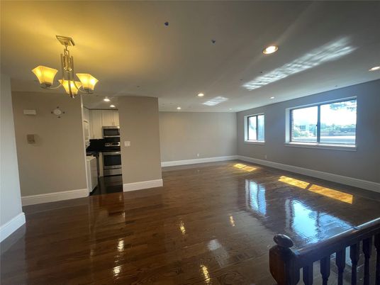 Chandelier, Empty room, Interior, Kitchen, Recessed Lighting, Stainless Steel Appliances, Wood Texture Flooring