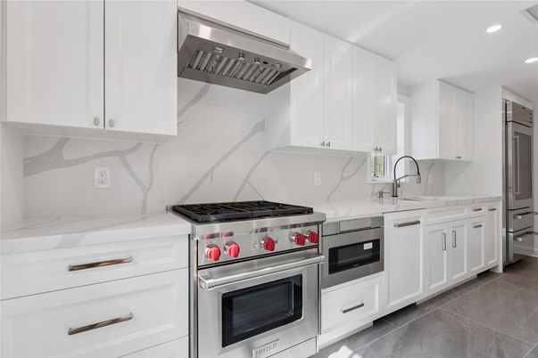 Interior, Kitchen, Marble Walls, Recessed Lighting, Stainless Steel Appliances