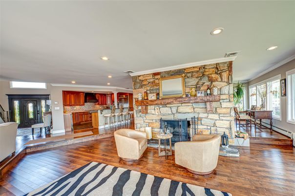 Dining room, Fireplace, Interior, Kitchen, Living room, Recessed Lighting, Stone Walls, Wood Texture Flooring