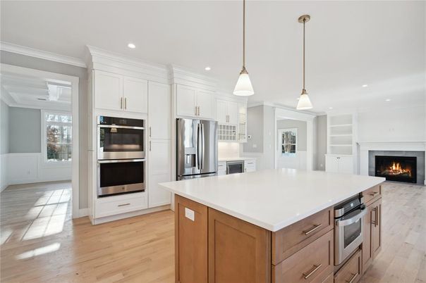 Fireplace, Interior, Kitchen, Pendant Lights, Recessed Lighting, Stainless Steel Appliances, Wood Texture Flooring