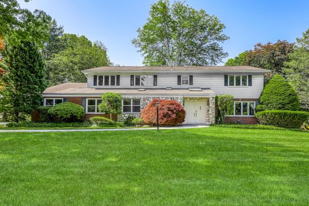 Attached, Backyard, Exterior, Facade, Brick Facade, Raised Ranch