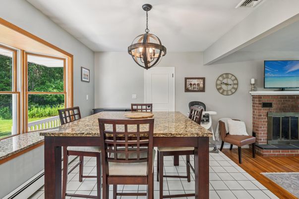 Chandelier, Dining room, Fireplace, Interior, Pendant Lights, Wood Texture Flooring