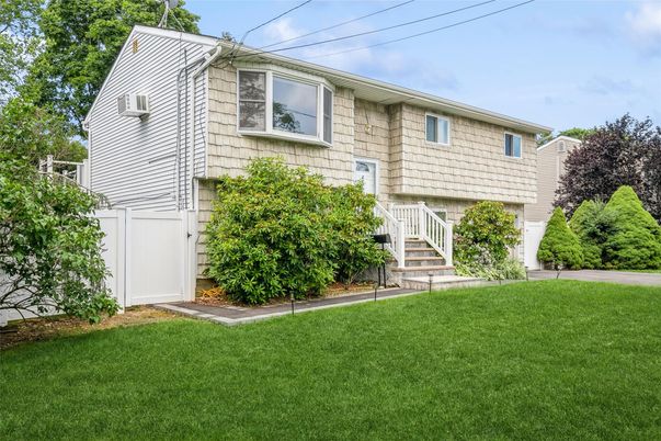 Attached, Exterior, Facade, Raised Ranch