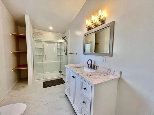 Bathroom, Dual Sink Vanities, Glass Shower, Interior, Marble, Recessed Lighting