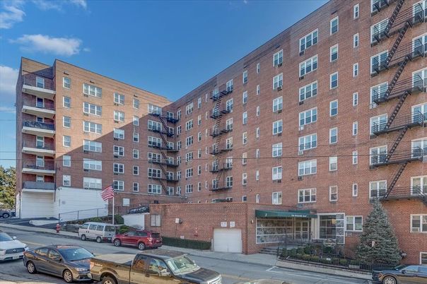 Attached, Exterior, Facade, Brick Facade, Condo Building