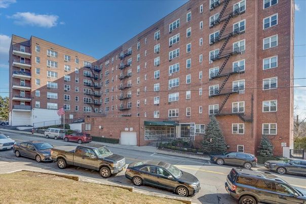 Exterior, Facade, Brick Facade, Condo Building