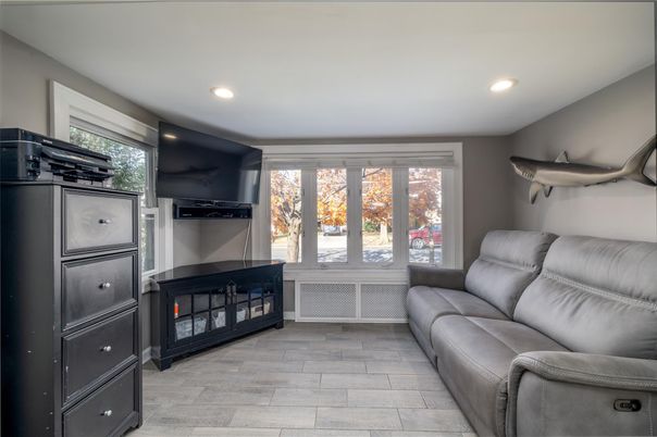 Fireplace, Interior, Living room, Recessed Lighting, Wood Texture Flooring